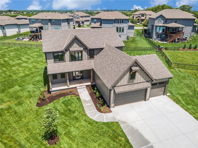 2314 SW Serena Pl, Lees Summit, MO 64082 - view of front of house featuring roof with shingles, a residential view, concrete driveway, and a garage