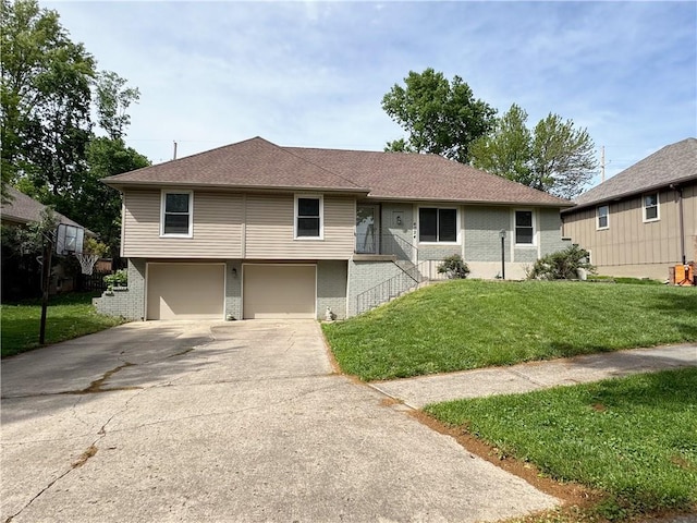 4024 NE 59th Ter, Gladstone, MO 64119 - single story home with brick siding, a garage, a front yard, and concrete driveway