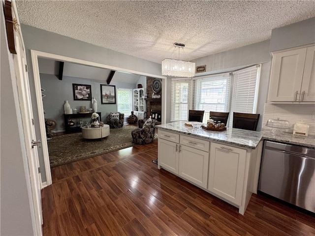 4024 NE 59th Ter, Gladstone, MO 64119 - kitchen featuring light stone countertops, dark wood-type flooring, white cabinetry, lofted ceiling with beams, and dishwasher
