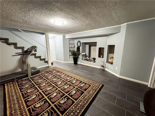 4024 NE 59th Ter, Gladstone, MO 64119 - interior space featuring stairs, a textured ceiling, baseboards, and tile patterned floors