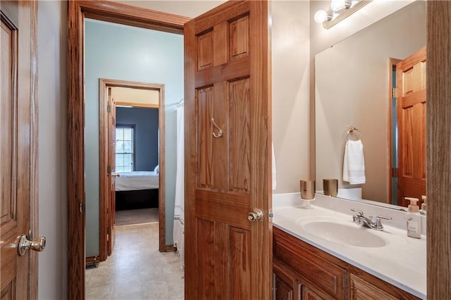 bathroom with vanity and tile patterned floors