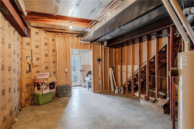 below grade area featuring water heater