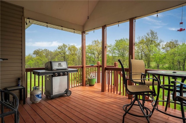 wooden deck with area for grilling