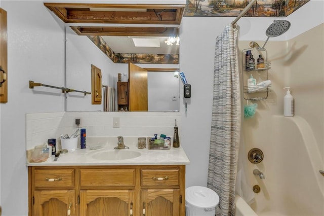 bathroom featuring vanity and shower / tub combo
