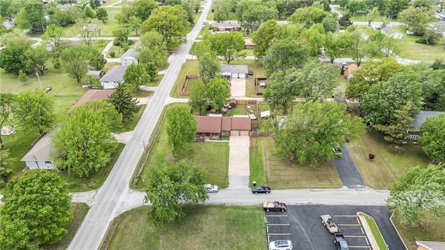 birds eye view of property with a residential view