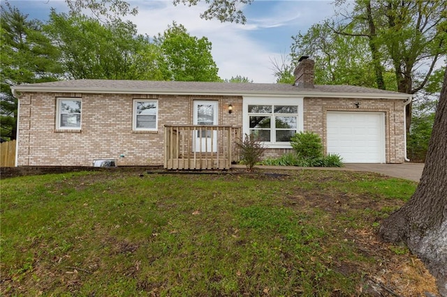 ranch-style home featuring a front lawn, brick siding, a garage, a chimney, and concrete driveway