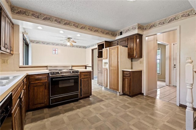 kitchen with high end fridge, black dishwasher, light countertops, a ceiling fan, and range with electric cooktop