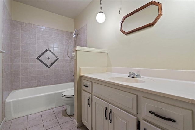 bathroom with tile patterned flooring, tub / shower combination, toilet, and vanity
