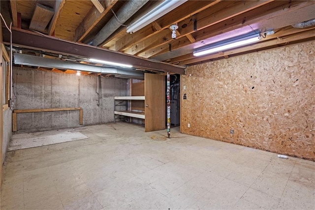 unfinished basement with tile patterned floors