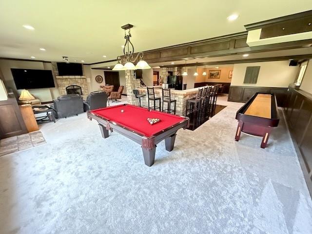 playroom with carpet flooring, recessed lighting, a large fireplace, billiards, and a dry bar