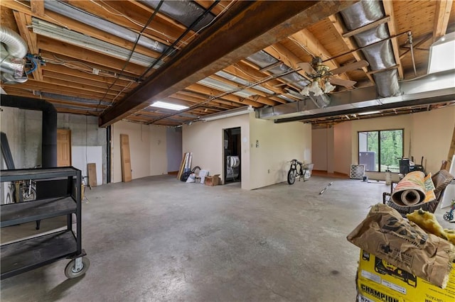 basement featuring a wood stove