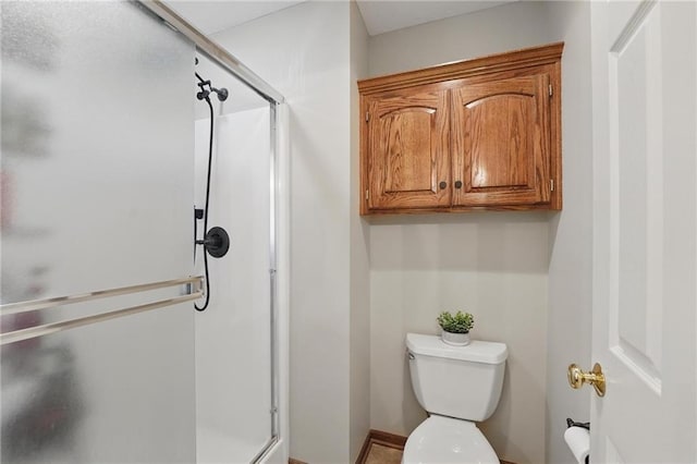 22721 E 27th Street Ct S, Blue Springs, MO 64015 - bathroom featuring a shower stall, toilet, and baseboards