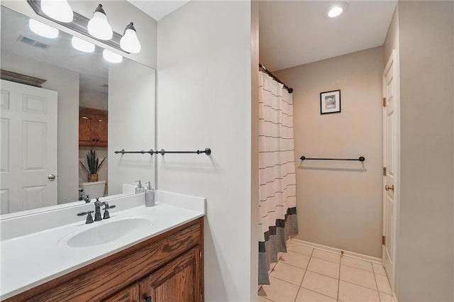 22721 E 27th Street Ct S, Blue Springs, MO 64015 - full bathroom with tile patterned flooring, vanity, baseboards, and a shower with curtain