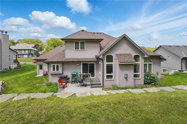 22721 E 27th Street Ct S, Blue Springs, MO 64015 - rear view of property featuring a patio area, a yard, and a shingled roof