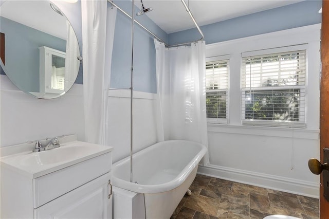 3700 Jefferson St, Kansas City, MO 64111 - bathroom featuring stone finish floors and vanity
