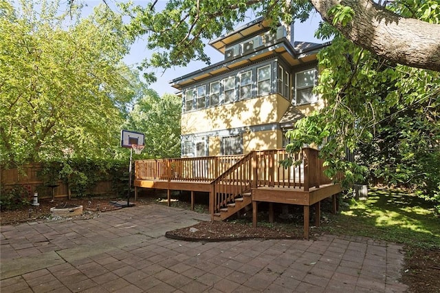 3700 Jefferson St, Kansas City, MO 64111 - back of house with a patio, a wooden deck, and fence