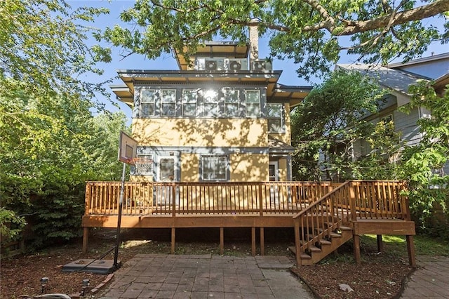3700 Jefferson St, Kansas City, MO 64111 - back of property featuring a wooden deck
