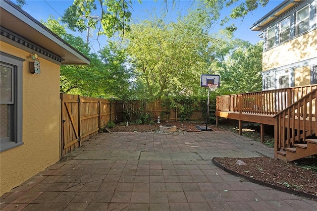 3700 Jefferson St, Kansas City, MO 64111 - view of patio / terrace with a fenced backyard and a deck