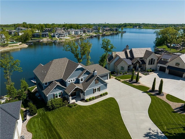18 Black Hawk Dr, Lake Winnebago, MO 64034 - aerial view of residential area featuring a nearby body of water
