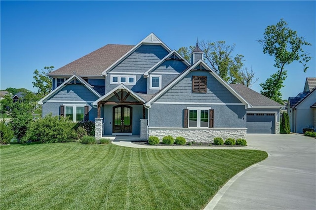 18 Black Hawk Dr, Lake Winnebago, MO 64034 - craftsman-style home with stone siding, a garage, french doors, and a front lawn