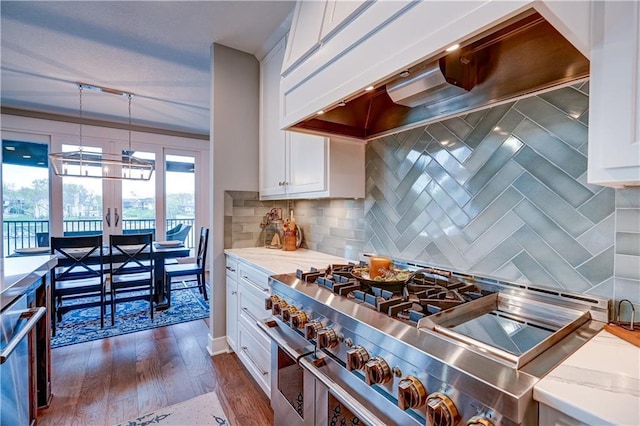 18 Black Hawk Dr, Lake Winnebago, MO 64034 - kitchen featuring appliances with stainless steel finishes, custom range hood, white cabinetry, and light stone countertops