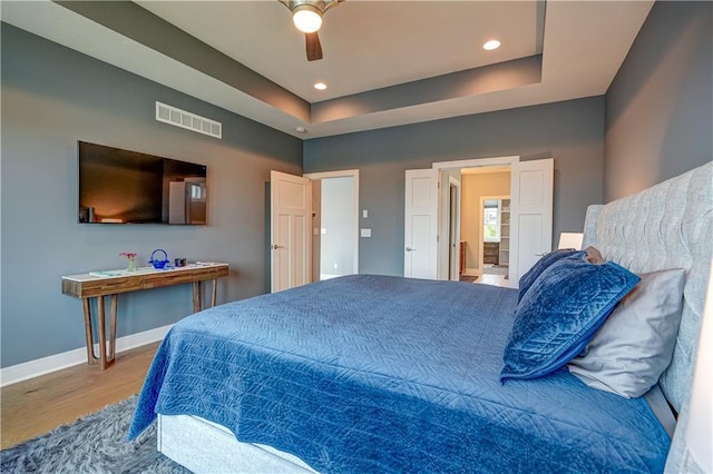 18 Black Hawk Dr, Lake Winnebago, MO 64034 - bedroom with wood finished floors, baseboards, ceiling fan, and recessed lighting