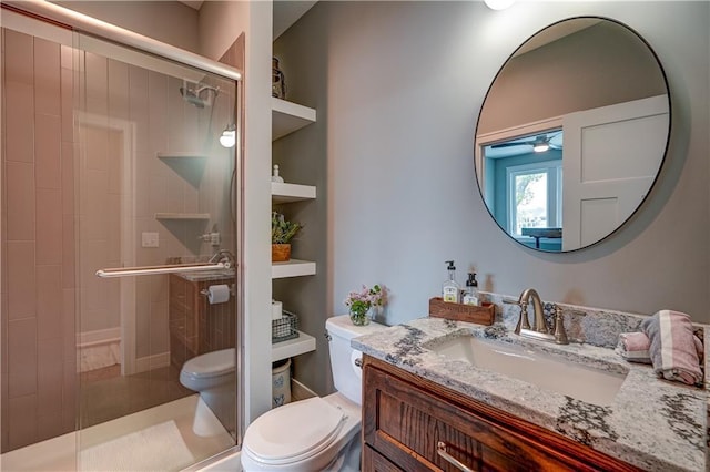 18 Black Hawk Dr, Lake Winnebago, MO 64034 - full bathroom featuring toilet, a shower stall, and vanity