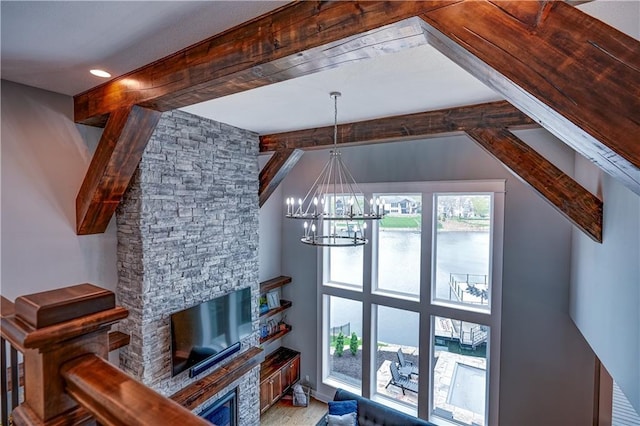 18 Black Hawk Dr, Lake Winnebago, MO 64034 - living area with a chandelier, beamed ceiling, and wood finished floors