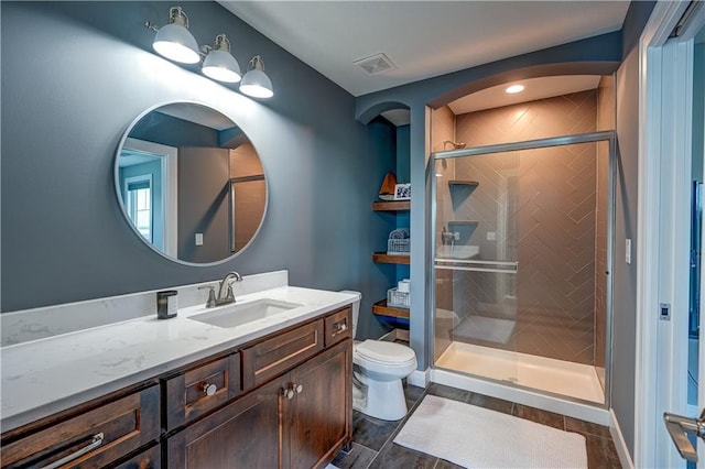 18 Black Hawk Dr, Lake Winnebago, MO 64034 - bathroom with a stall shower, toilet, vanity, and wood finished floors