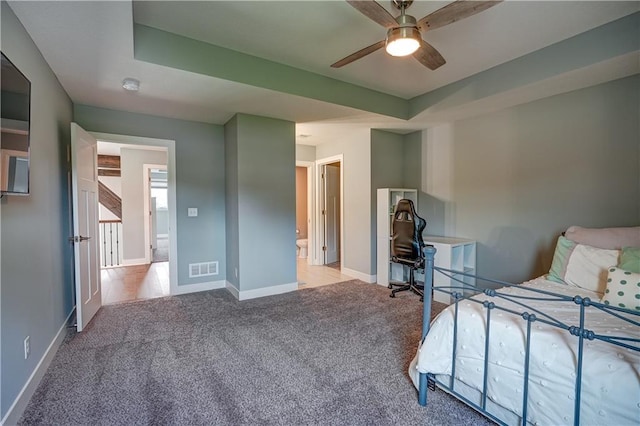 18 Black Hawk Dr, Lake Winnebago, MO 64034 - carpeted bedroom with baseboards, a ceiling fan, and connected bathroom