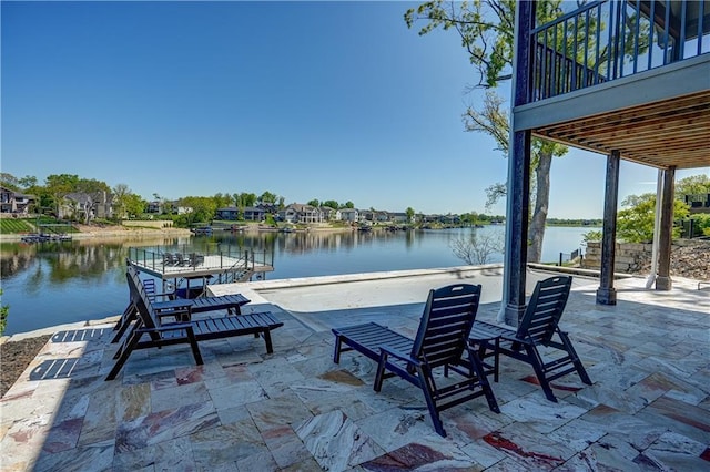 18 Black Hawk Dr, Lake Winnebago, MO 64034 - view of patio / terrace featuring a water view