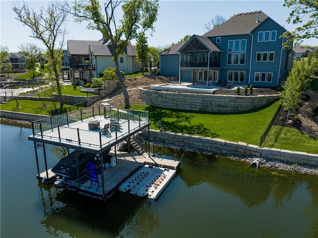 18 Black Hawk Dr, Lake Winnebago, MO 64034 - dock with a water view, a yard, boat lift, and a residential view