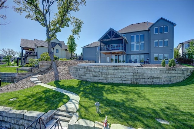 18 Black Hawk Dr, Lake Winnebago, MO 64034 - view of green lawn featuring a balcony and a residential view