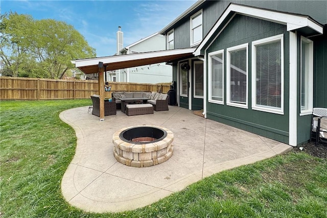 4200 Grand Ave, Leavenworth, KS 66048 - view of patio / terrace with a fenced backyard and an outdoor living space with a fire pit