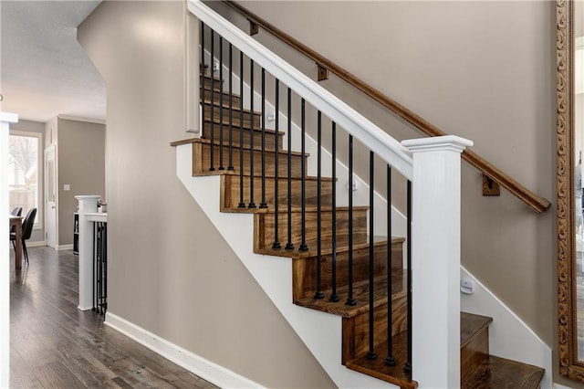 4200 Grand Ave, Leavenworth, KS 66048 - staircase featuring baseboards and wood finished floors