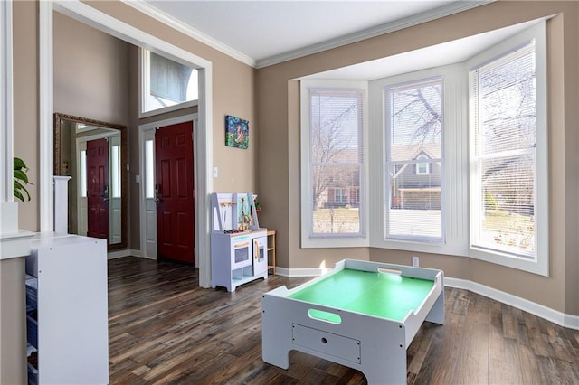 4200 Grand Ave, Leavenworth, KS 66048 - playroom with crown molding, baseboards, and a wealth of natural light