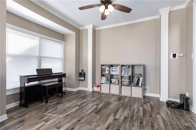 4200 Grand Ave, Leavenworth, KS 66048 - living area featuring crown molding, ornate columns, and wood finished floors
