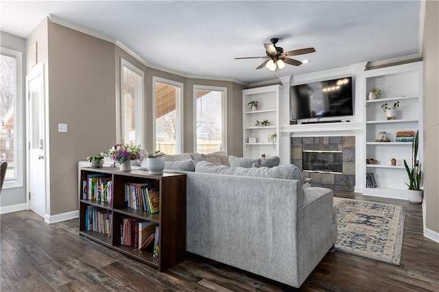 4200 Grand Ave, Leavenworth, KS 66048 - living area featuring crown molding, a ceiling fan, a wealth of natural light, and a fireplace
