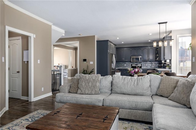4200 Grand Ave, Leavenworth, KS 66048 - living room with recessed lighting, baseboards, ornamental molding, and wood finished floors