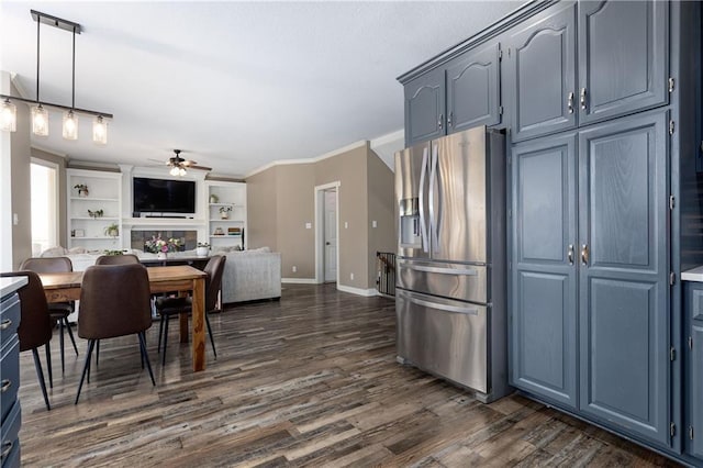 4200 Grand Ave, Leavenworth, KS 66048 - kitchen with a ceiling fan, blue cabinets, dark wood finished floors, stainless steel fridge with ice dispenser, and open floor plan