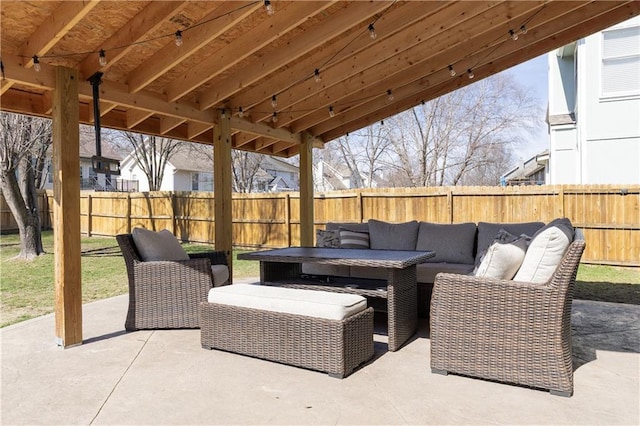 4200 Grand Ave, Leavenworth, KS 66048 - view of patio with an outdoor living space and a fenced backyard
