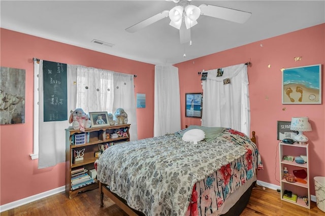 524 Truman St, Pomona, KS 66076 - bedroom with baseboards, wood finished floors, and ceiling fan