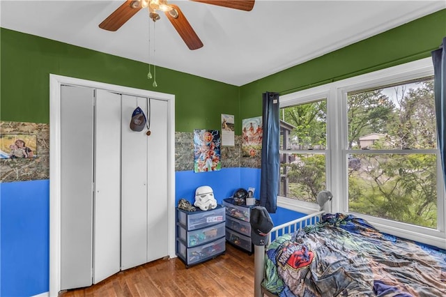 524 Truman St, Pomona, KS 66076 - bedroom with wood finished floors, ceiling fan, and a closet