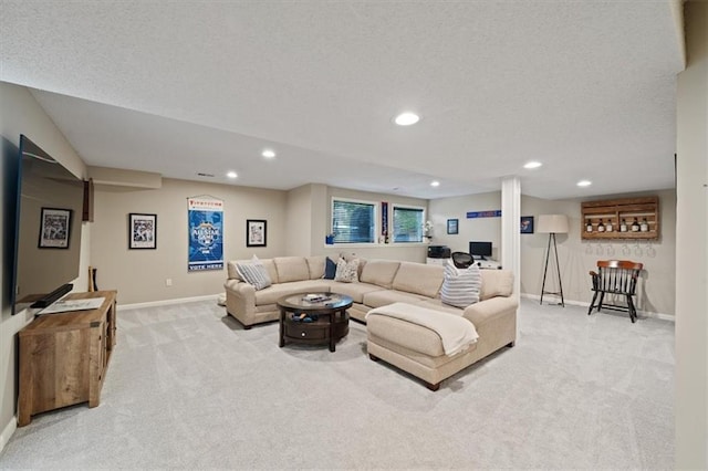 living room featuring baseboards, recessed lighting, and light colored carpet