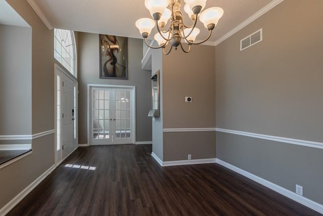 6512 N Fisk Ct, Kansas City, MO 64151 - unfurnished dining area with a chandelier, dark wood-style floors, baseboards, and ornamental molding