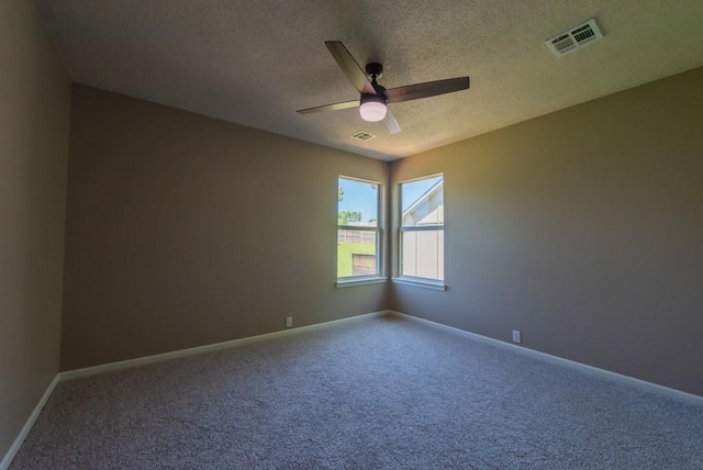 6512 N Fisk Ct, Kansas City, MO 64151 - unfurnished room featuring ceiling fan, carpet flooring, a textured ceiling, and baseboards