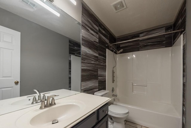 6512 N Fisk Ct, Kansas City, MO 64151 - full bathroom with toilet, vanity, bathing tub / shower combination, tile patterned floors, and tile walls