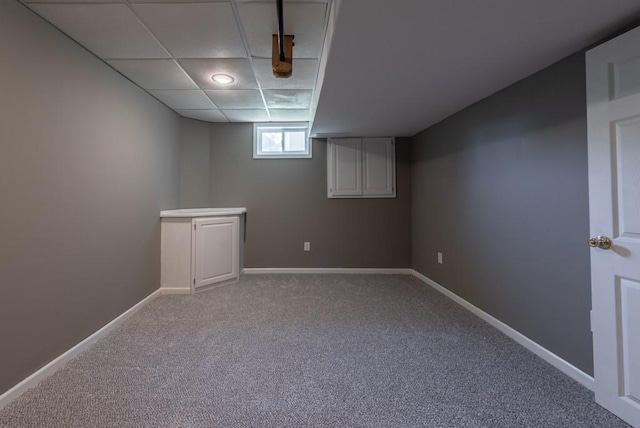6512 N Fisk Ct, Kansas City, MO 64151 - below grade area featuring carpet and baseboards