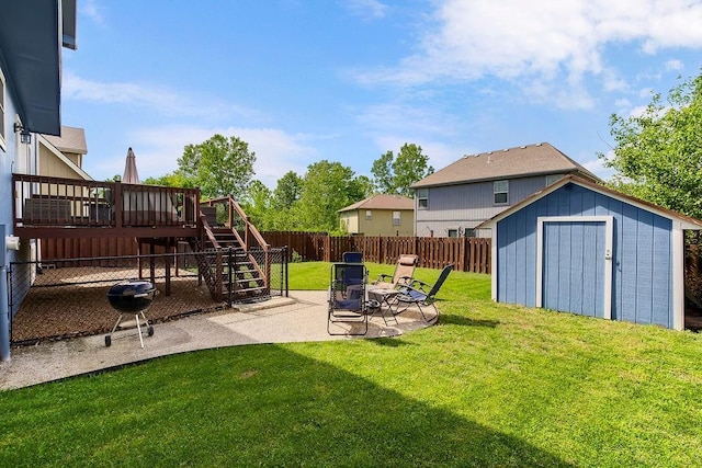 1024 Tamarisk Dr, Leavenworth, KS 66048 - view of yard with a patio, stairs, and a deck
