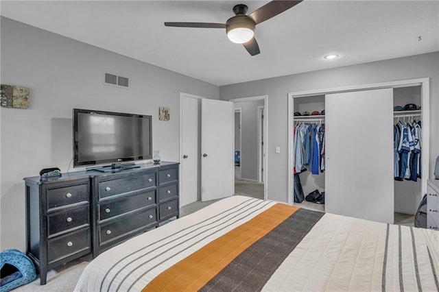 carpeted bedroom featuring a closet, a ceiling fan, and recessed lighting